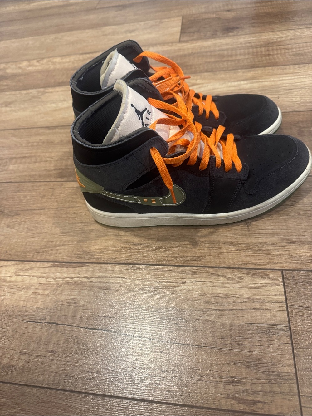 Jordan Men’s Black High-Top Sneakers with Orange Laces